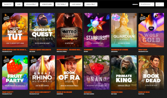 Nitrocasino aula. Kasinon peliaulassa nähtävillä monia tuttuja ja suosittuja kolikkopelejä, kuten Book of Dead ja Starburst.